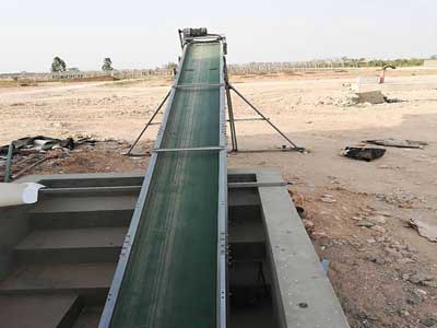 transverse manure conveying system broiler cage